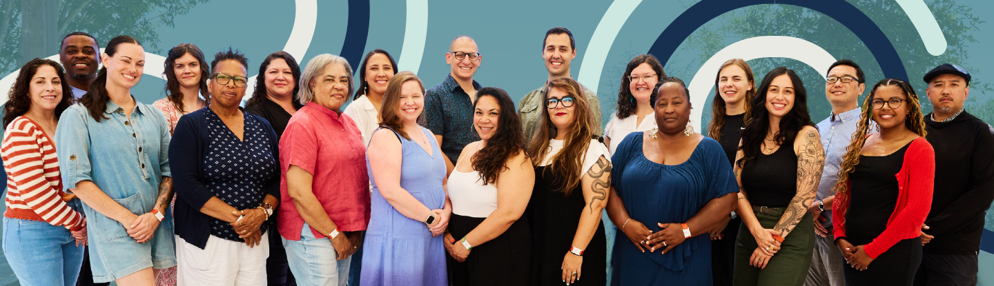 Magic Cabinet team members appear in front of a blue background with several multi-colored pathways.